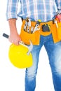 Midsection of manual worker holding hardhat and hammer Royalty Free Stock Photo