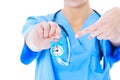 Midsection Of Nurse Pointing At Toy Alarm Clock