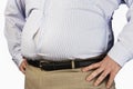 Midsection Of An Obese Man Wearing Tight Formal Shirt Royalty Free Stock Photo