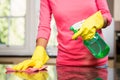 Midsection of woman cleaning the counter Royalty Free Stock Photo