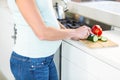 Midsection of woman cutting vegetables Royalty Free Stock Photo