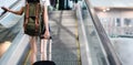 Midsection Woman With Luggage Traveling at Airport