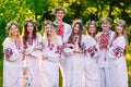Midsummer. A group of young people of Slavic appearance at the celebration of Midsummer