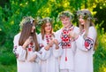 Midsummer. A group of young people of Slavic appearance at the celebration of Midsummer