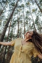 Midsummer solstice ritual. Woman with long hair dance on nature background