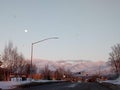 Midtown Anchorage Alaska with the moon in sight