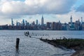 Midtown Manhattan Skyline in New York City seen from the Shore of Williamsburg Brooklyn New York Royalty Free Stock Photo