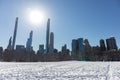 Midtown Manhattan Skyline seen from the Snow Covered Sheep Meadow at Central Park during the Winter in New York City Royalty Free Stock Photo