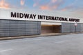 Midway International Airport sign at sunset. Royalty Free Stock Photo