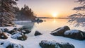 Midwinter, island off the coast of a lake, trees and rocks. Cold sunrise on the lake island.