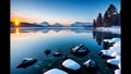 Midwinter, island off the coast of a lake, trees and rocks. Cold sunrise on the lake island.