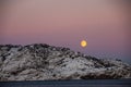 Midwinter moon over Bodo Royalty Free Stock Photo