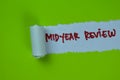 Midyear Review Text written in torn paper Royalty Free Stock Photo
