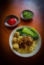 Mie ayam or noodles chicken is traditional food from indonesia, asia made from noodle, chicken, chicken broth, spinach, sometimes.