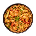 Mie Goreng in black bowl isolated on white. Indonesian cuisine prawn noodles and vegetables stir fired dish. Asian food