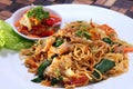 Mie Goreng, a famous Indonesian specialty. In the form of noodles cooked by roasting. This photo is combined with catfish.