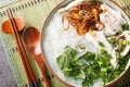 Mien Ga is a super simple and delicious Vietnamese chicken soup with cellophane noodles closeup on the bowl. Horizontal top view