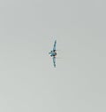 Mig 21 Lancer pilot training over the city sky. Bucharest, Romania