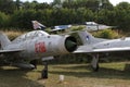 MIG 1960`s Russian fighter with Jaguar British fighter behind at Chateau de Savigny near Beaune in Burgundy, France