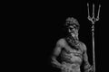 The mighty god of sea and oceans Neptune Poseidon, Triton. Neptun`s trident as symbol strength, power and unrestraint. Black an