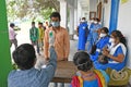 Migrant labourers rescued and confined at a `Burdwan Bidyarthi Bhaban High School` complex have queued up for health screening for