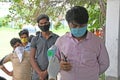 Migrant labourers rescued and confined at a `Burdwan Bidyarthi Bhaban High School` complex have queued up for health screening for