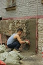 Migrant workers build and repair buildings in Moscow