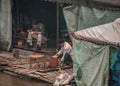 Migrant workers eating in their tents on rafts on Li River downtown, Guilin, China