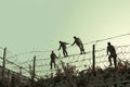 Migrants climb over border fence traffic. Generate Ai