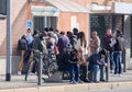 migrants lined up in front of the police office