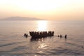 Migrants in an overcrowded boat cross the sea