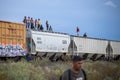 Migrants on train traveling to USA border with Mexico