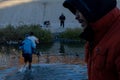 Migrants crossing river into USA from Mexico Royalty Free Stock Photo