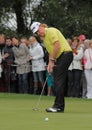 Miguel Angel Jimenez. plays his putt.