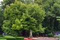 Mihai Eminescu Monument. Statue and Linden Tree of Mihai Eminescu in Copou Park - landmark attraction in Iasi, Romania