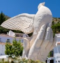 MIJAS, ANDALUCIA/SPAIN - JULY 3 : Statue of a Dove in the Hand i