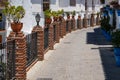 MIJAS, ANDALUCIA/SPAIN - JULY 3 : View of Brick Piers and Blue F Royalty Free Stock Photo