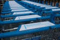 Ow of customer shopping trolley carts for Hoogvliet shop