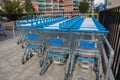 Row of customer shopping trolley carts for Hoogvliet shop