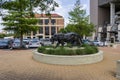 The Mike the Tiger Statue with lush green plants and trees at Tiger Stadium on the Campus of Louisiana State University