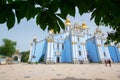 Mikhailovsky monastery with with chestnut leaves in the foreground, summer city center of Kyiv