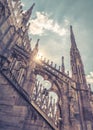 Milan Cathedral closeup, Italy. Detail of luxury decoration of roof. Famous main church of Milan Duomo di Milano is top landmark Royalty Free Stock Photo