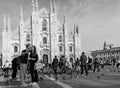 Milan Cathedral, a couple selfie kissing in black and white. Royalty Free Stock Photo