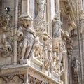 Milan Cathedral Duomo di Milano close-up, Milan, Italy. Detail of luxury facade with many marble statues and reliefs. Milan Royalty Free Stock Photo