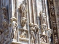 Milan Cathedral Duomo di Milano close-up, Milan, Italy. Detail of luxury facade with many marble statues and reliefs Royalty Free Stock Photo