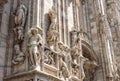 Milan Cathedral Duomo di Milano closeup, Milan, Italy. Detail of luxury facade with many marble statues and reliefs Royalty Free Stock Photo