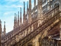Milan Cathedral or Duomo di Milano, Italy. Scenery of luxury roof. Famous Milan Cathedral is a top landmark of city. Ornate Gothic Royalty Free Stock Photo