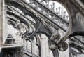 Milan cathedral roof gothic ornaments spire pointed archs statues Royalty Free Stock Photo