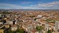 Milan cityscape against a background of blue sky, view from above in sunny weather Royalty Free Stock Photo