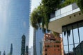 Milan 07/15/2020: district of Porta Nuova, plants on terrace of Bosco Verticale buildiing and skyscraper